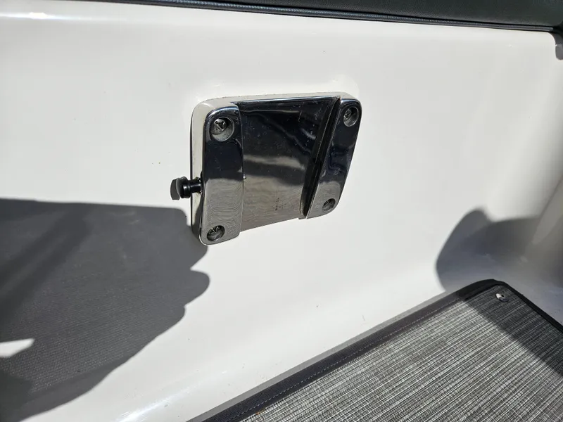 Slide: The Image of Close-up of a 2020 Chaparral 230 Suncoast boat detail. - 12