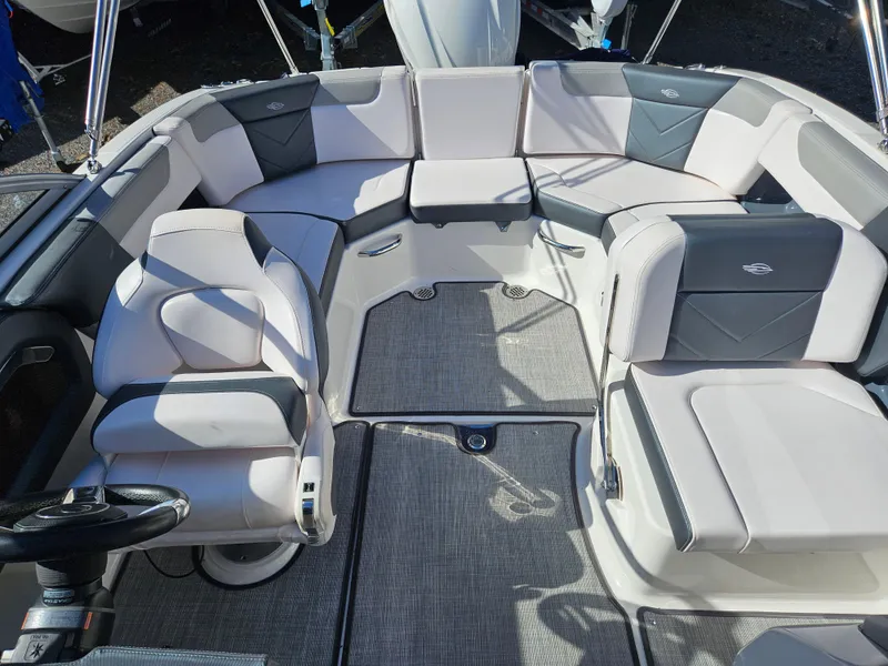 Slide: The Image of Interior of 2020 Chaparral 230 Suncoast with gray upholstery. - 19
