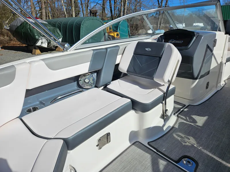 Slide: The Image of Interior of a 2020 Chaparral 230 Suncoast boat with gray seating. - 20