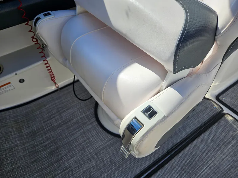 Slide: The Image of Chaparral 230 Suncoast 2020 boat seat with upholstery and controls. - 21