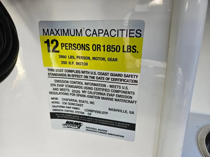 Slide: The Image of Capacity label for 12 persons or 1850 lbs on Chaparral 230 Suncoast 2020. - 9