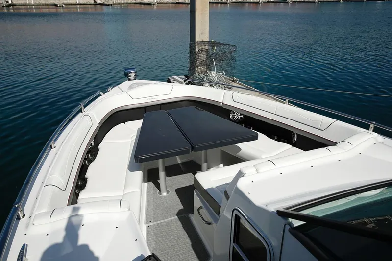 Slide: The Image of Manufacturer Provided Image: 2021 Formula 350 Crossover Bowrider I/O with spacious seating and dual tables on the water. - 13
