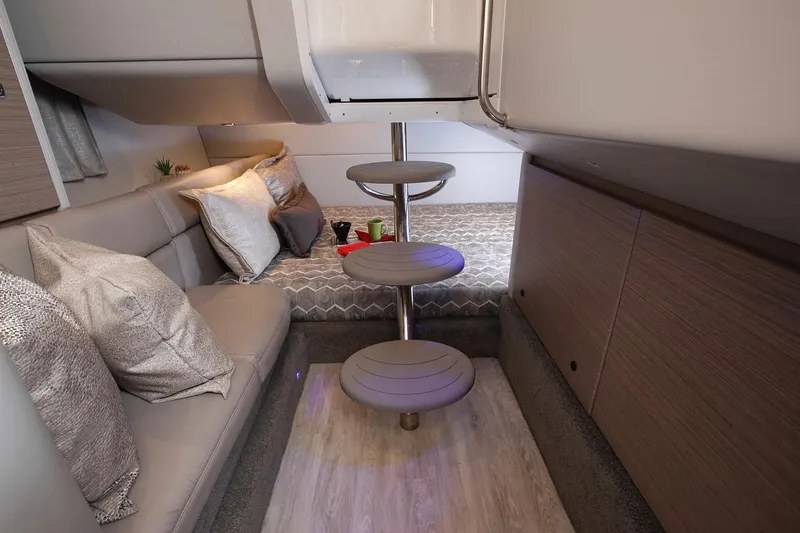 Slide: The Image of Manufacturer Provided Image: Interior cabin of 2021 Formula 350 Crossover Bowrider I/O with modern seating and bedding. - 16