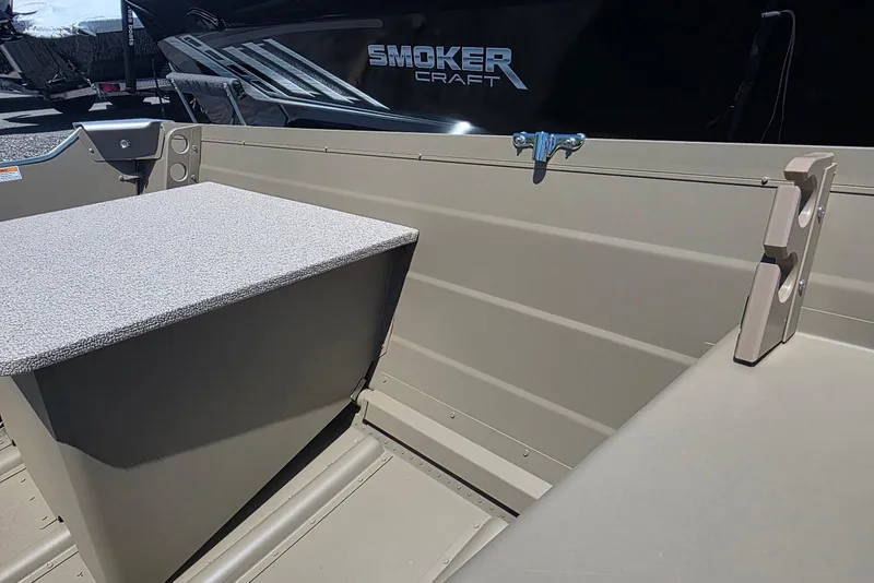 Slide: The Image of 2026 Smoker Craft Voyager 16 interior with seating and storage features. - 8