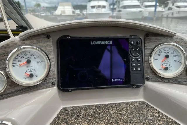 Slide: The Image of Dashboard of a 2014 Stingray 250 LR boat with Lowrance HDS7 display. - 5