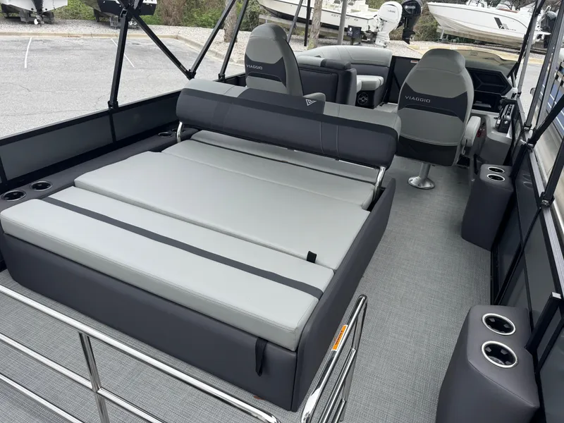 Slide: The Image of Viaggio Lago X-S 2025 boat interior with gray seating and modern design. - 5