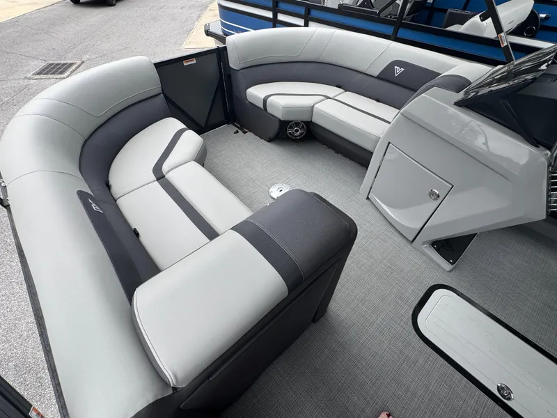 Slide: The Image of 2025 Viaggio Lago X-S boat interior with gray seating and modern design. - 8