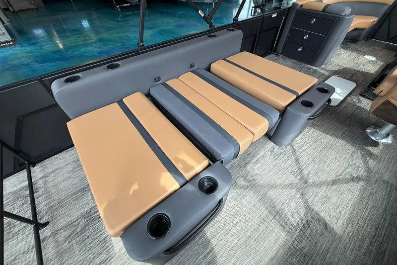 Slide: The Image of 2025 Viaggio Lago X-D interior with convertible seating and integrated cup holders. - 13