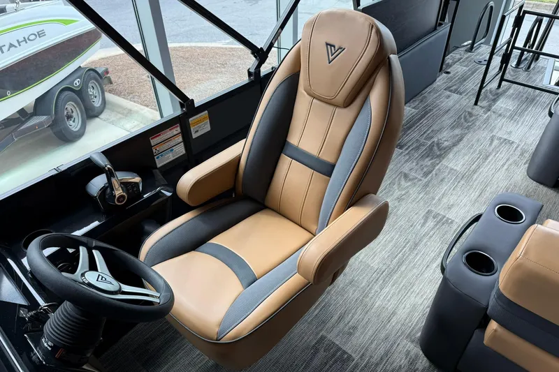 Slide: The Image of Luxurious Viaggio Lago X-D 2025 boat interior with premium captain's chair and steering wheel. - 9