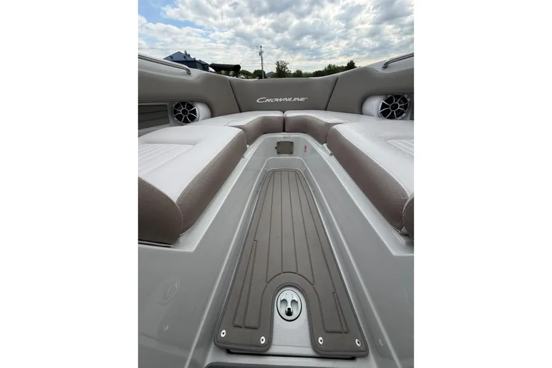 Slide: The Image of 2026 Crownline 278 SS boat interior with cushioned seating and sleek design. - 22
