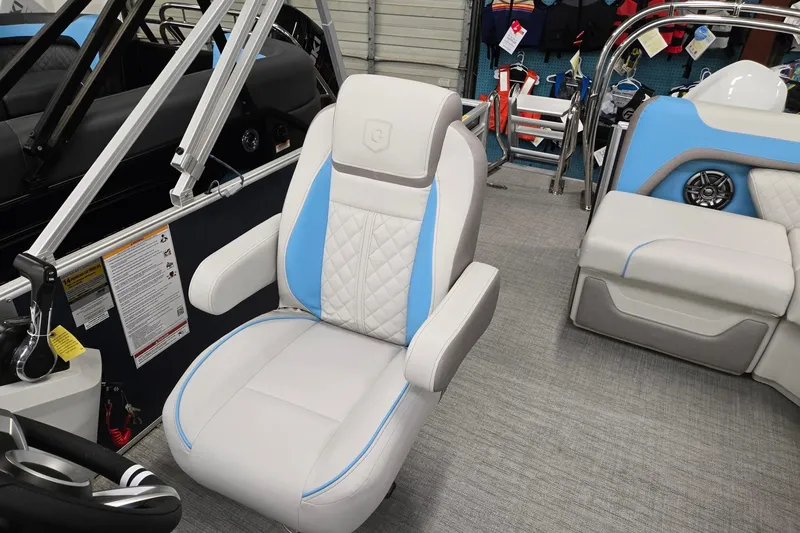 Slide: The Image of 2026 Godfrey Sweetwater 2086 C boat interior with plush seating and modern design. - 10