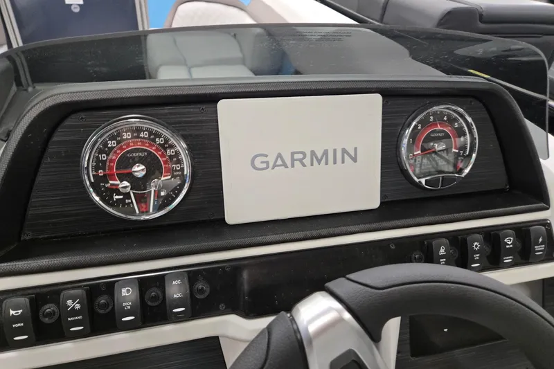 Slide: The Image of Dashboard of 2026 Godfrey Sweetwater 2086 C with Garmin display and gauges. - 12