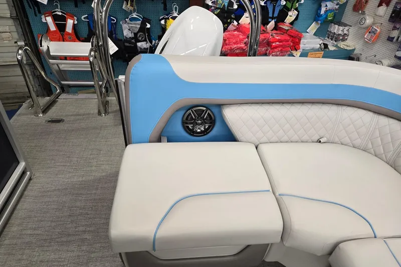 Slide: The Image of Interior of 2026 Godfrey Sweetwater 2086 C boat with blue and white seating. - 17