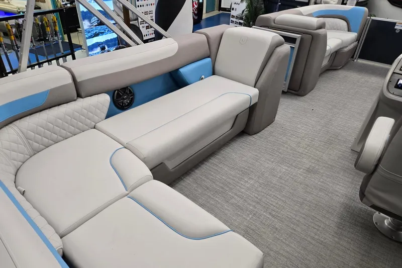 Slide: The Image of Luxurious interior of 2026 Godfrey Sweetwater 2086 C pontoon boat with plush seating. - 22