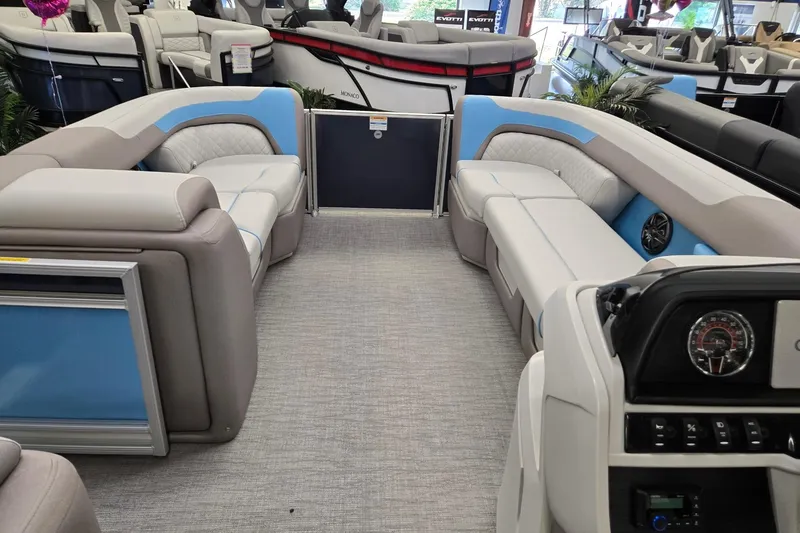 Slide: The Image of Interior view of 2026 Godfrey Sweetwater 2086 C pontoon boat with plush seating. - 23