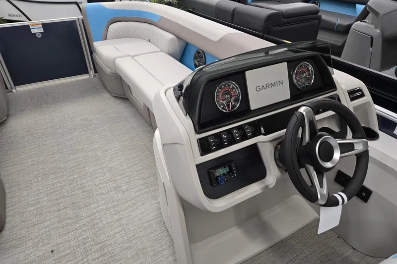 Slide: The Image of Interior of 2026 Godfrey Sweetwater 2086 C boat with Garmin dashboard and seating. - 24