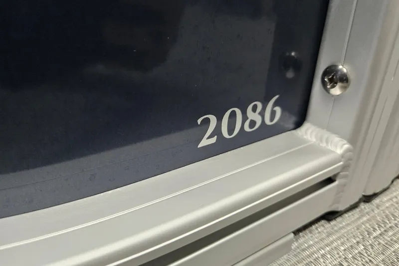 Slide: The Image of Close-up of Godfrey Sweetwater 2086 C boat model, showcasing sleek design details. - 31