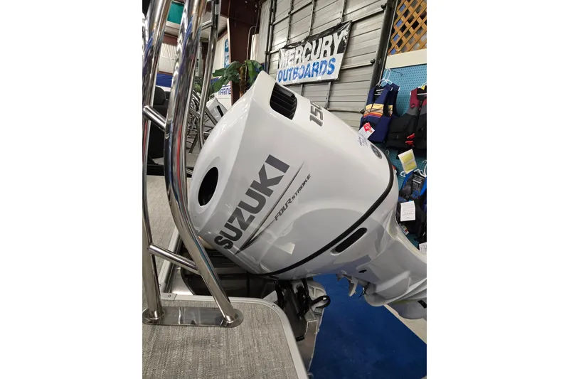 Slide: The Image of Suzuki outboard motor on a 2026 Godfrey Sweetwater 2086 C pontoon boat. - 32