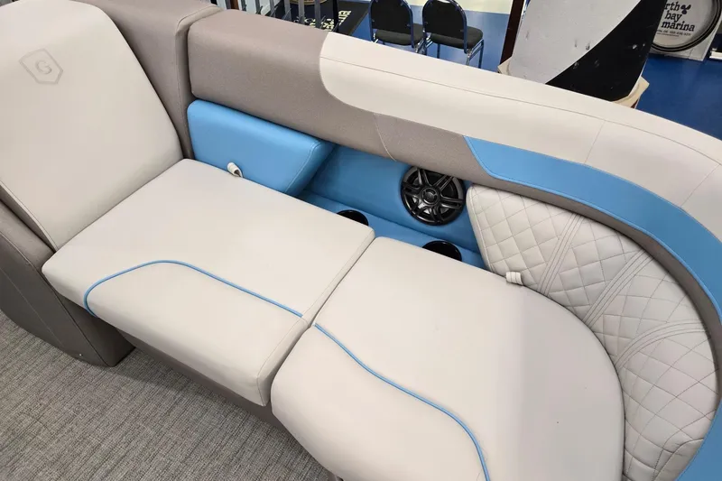 Slide: The Image of Luxurious seating on 2026 Godfrey Sweetwater 2086 C pontoon boat, featuring elegant design and speaker system. - 7