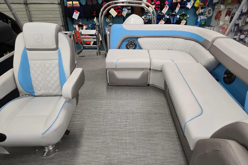 Slide: The Image of Interior of 2026 Godfrey Sweetwater 2086 C pontoon boat with plush seating and modern design. - 8
