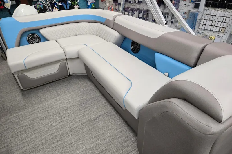 Slide: The Image of Luxurious seating on 2026 Godfrey Sweetwater 2086 C pontoon boat, featuring modern design and speakers. - 9