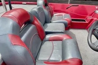 Slide: The Image of Red and gray interior of 2002 Nitro NX 882 SC boat. - 14