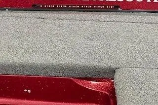 Slide: The Image of 2002 Nitro NX 882 SC boat deck with textured surface and red accents. - 24