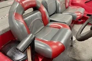 Slide: The Image of Red and gray seats in a 2002 Nitro NX 882 SC boat interior. - 7