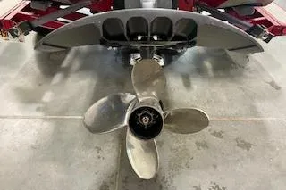Slide: The Image of Propeller of 2002 Nitro NX 882 SC boat on concrete floor. - 8