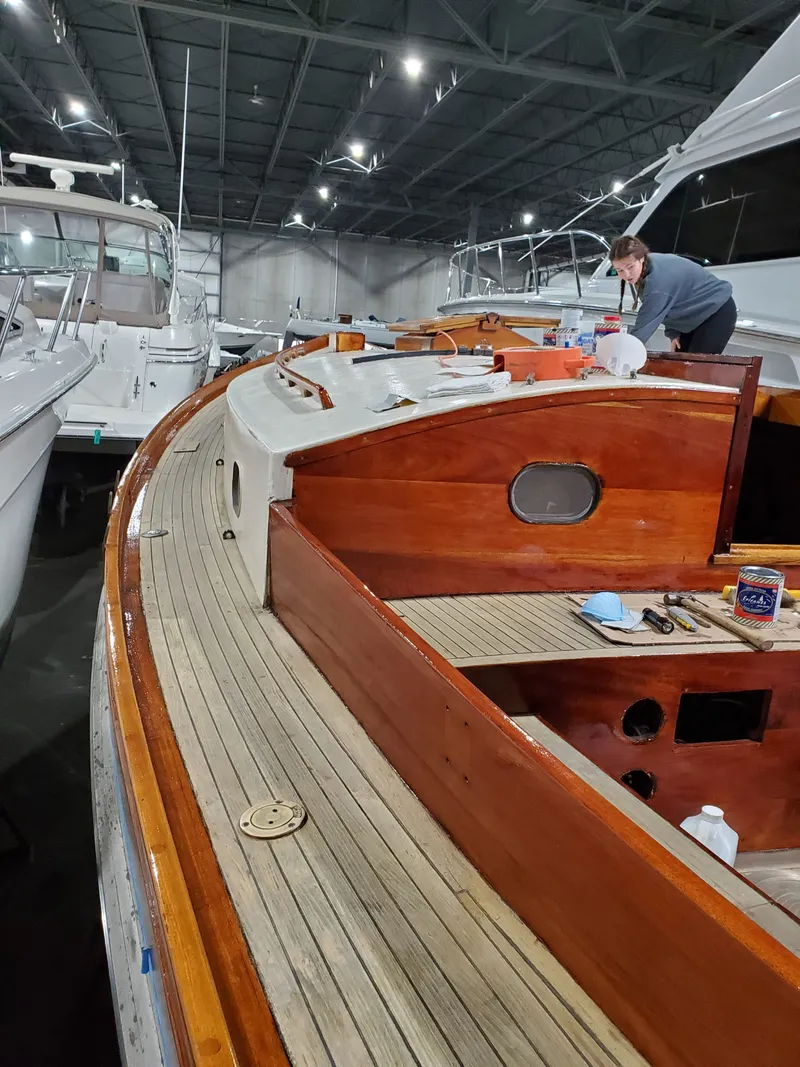 Slide: The Image of 1980 Ted Brewer Lazy Jack yacht in harbor, wooden deck and superstructure. - 10