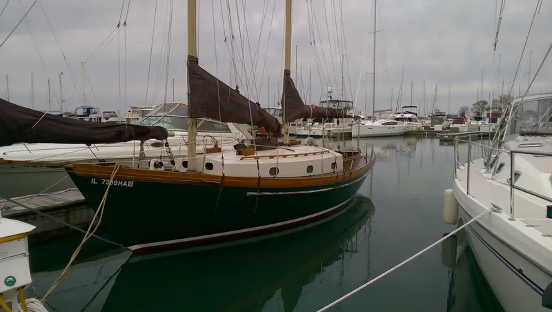 Slide: The Image of 1980 Ted Brewer Lazy Jack sailboat docked in harbor. - 4