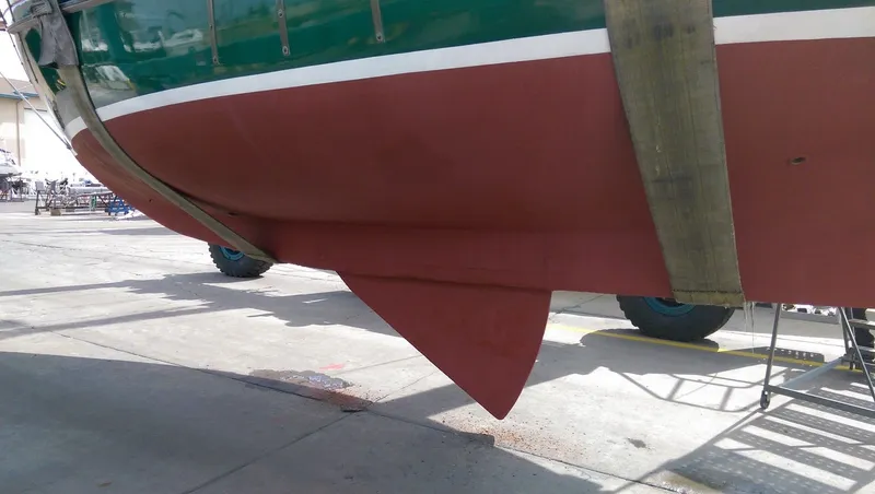 Slide: The Image of 1980 Ted Brewer Lazy Jack boat hull in shipyard. - 6