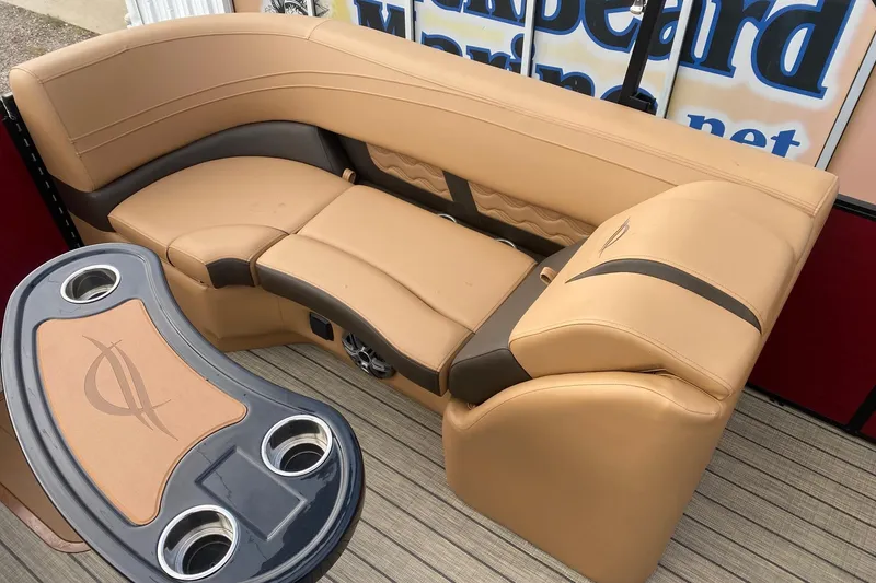 Slide: The Image of Luxurious seating on 2026 SunCatcher Fusion 324RC boat with cup holders and stylish design. - 11