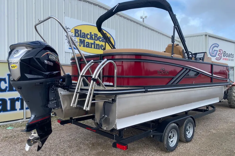 Slide: The Image of 2026 SunCatcher Fusion 324RC pontoon boat on trailer at BlackBeard Marine dealership. - 5