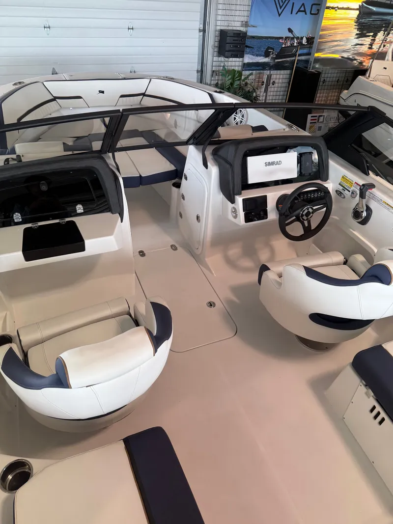 Slide: The Image of Interior of 2026 Stingray 20SBX boat with modern features. - 4