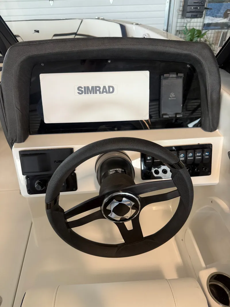 Slide: The Image of Dashboard of 2026 Stingray 20SBX with Simrad display. - 6