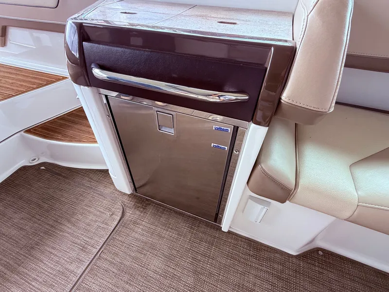 Slide: The Image of Interior of a 2016 Formula 310 BR with refrigerator. - 11