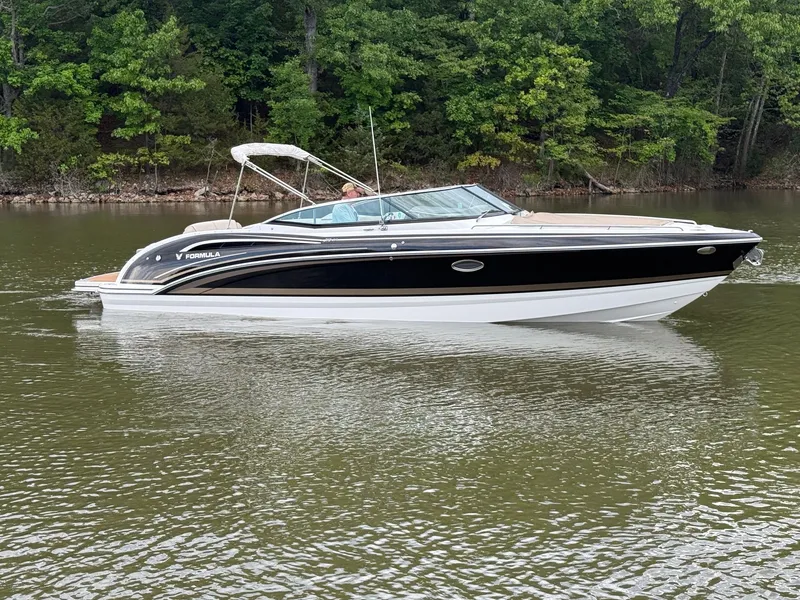 Slide: The Image of 2016 Formula 310 BR boat on calm water. - 2