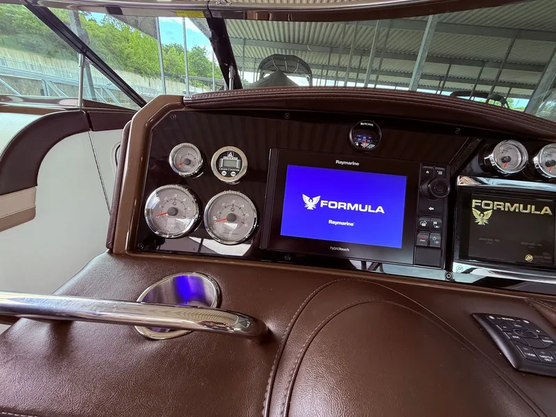 Slide: The Image of Dashboard of 2016 Formula 310 BR with Raymarine display. - 26