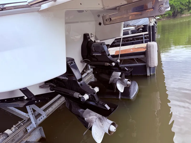 Slide: The Image of Rear view of a 2016 Formula 310 BR boat with dual engines. - 3