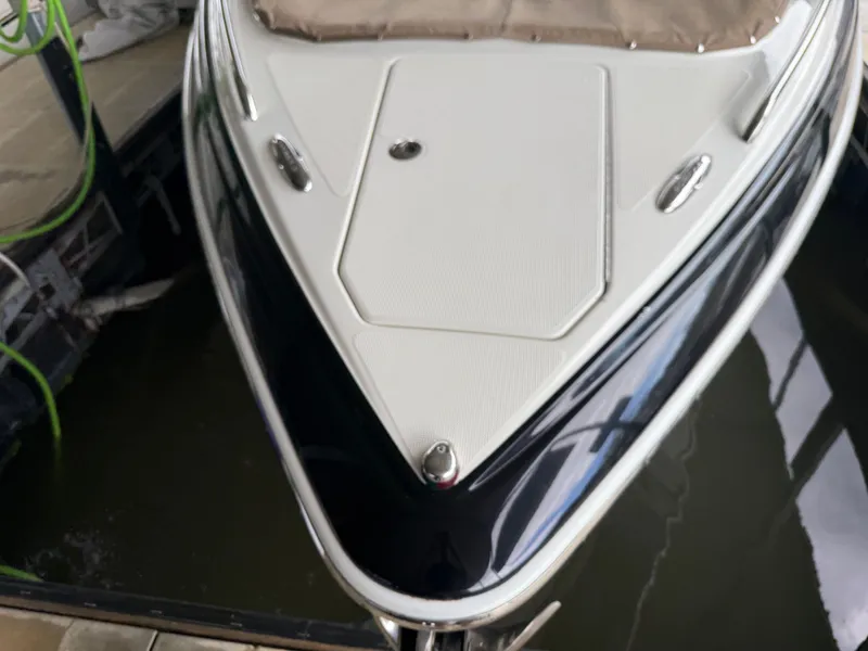 Slide: The Image of Bow of a 2016 Formula 310 BR boat in water. - 31