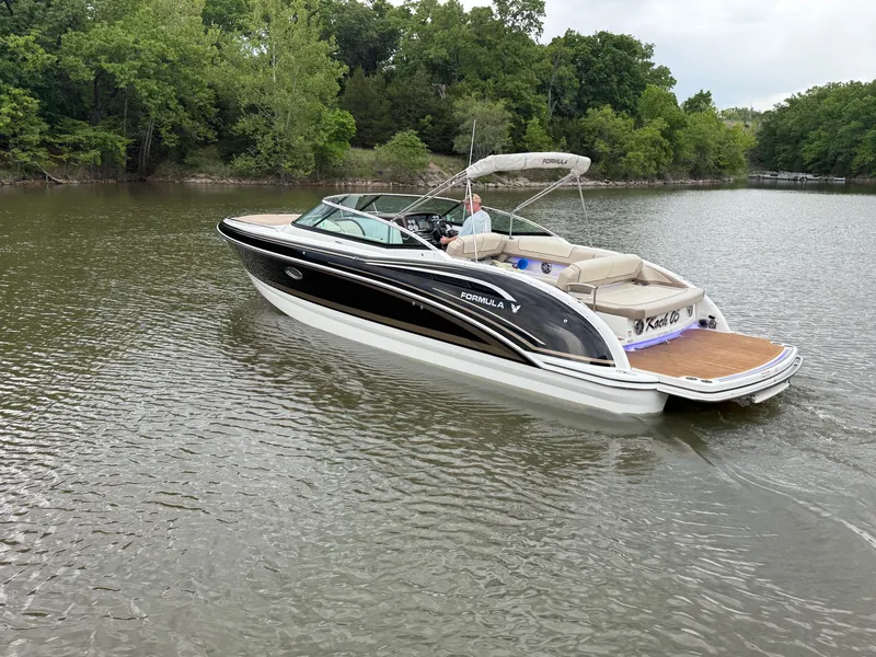 Slide: The Image of 2016 Formula 310 BR boat on a calm lake. - 35