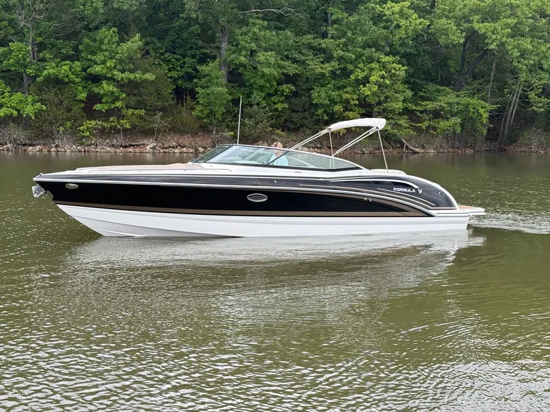 Slide: The Image of 2016 Formula 310 BR boat on a calm lake. - 38