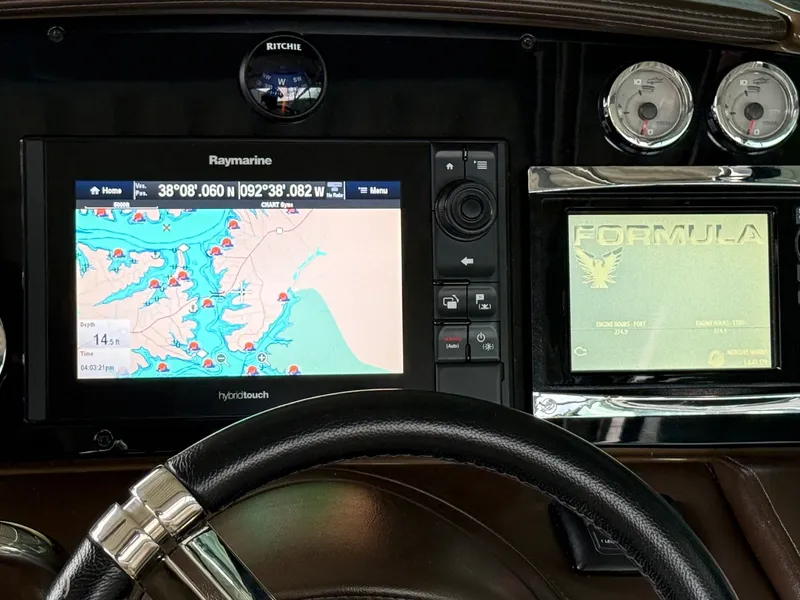 Slide: The Image of Dashboard of a 2016 Formula 310 BR with navigation system. - 42
