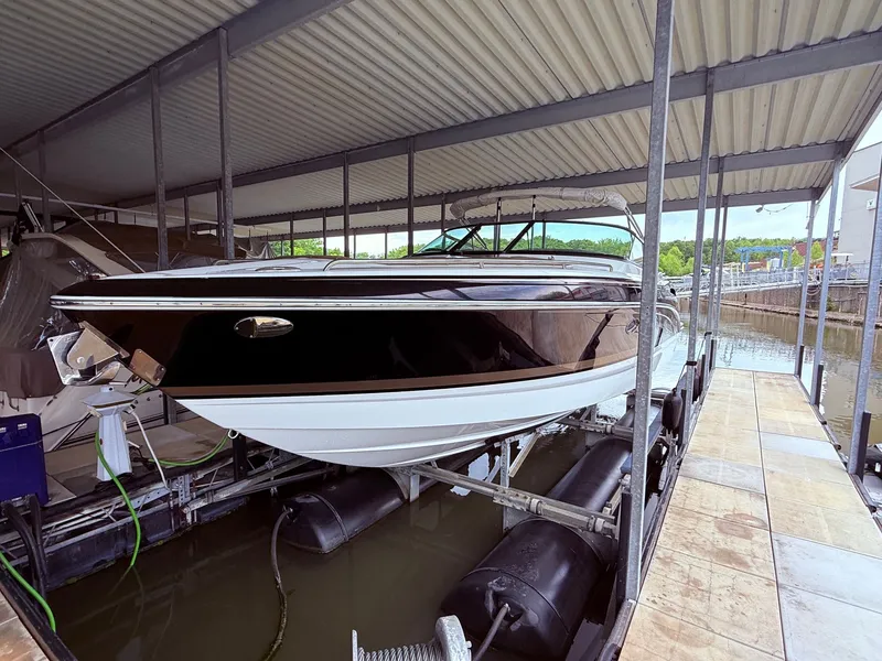Slide: The Image of 2016 Formula 310 BR boat in covered dock. - 5