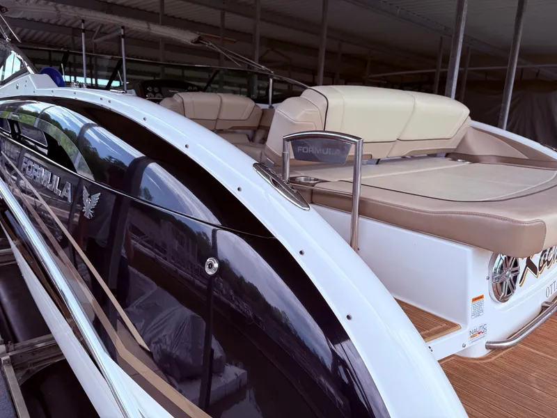 Slide: The Image of 2016 Formula 310 BR boat docked, luxurious design. - 7