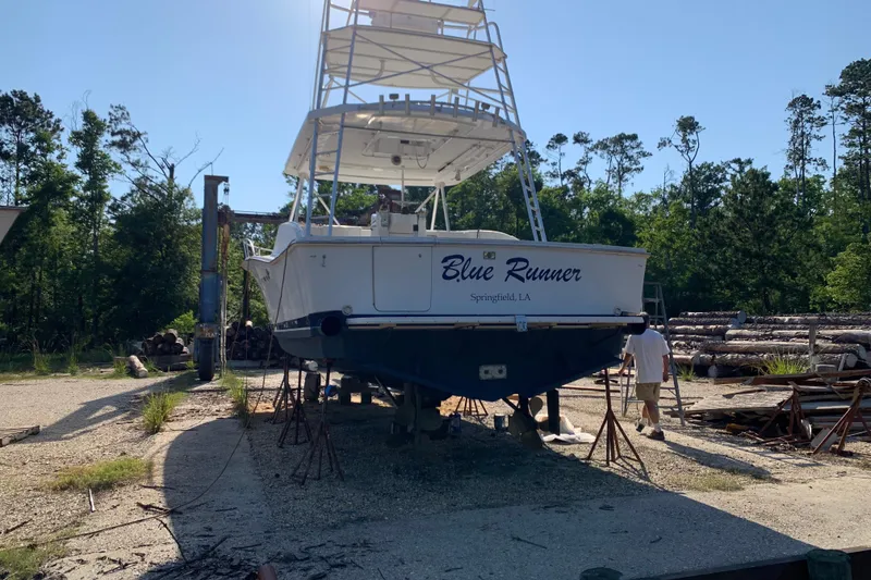 Slide: The Image of 1996 Luhrs 38 Open boat "Blue Runner" on dry dock in Springfield, LA. - 3