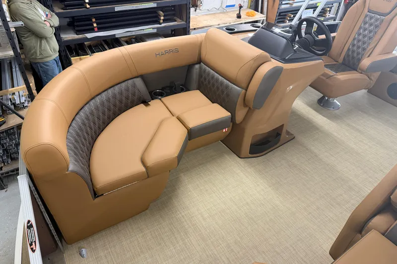 Slide: The Image of Luxurious interior of 2026 Harris Cruiser 190 SL boat with tan leather seating. - 4
