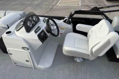 Slide: The Image of 2026 Lowe SS 230 WV boat interior with modern dashboard and comfortable seating. - 6