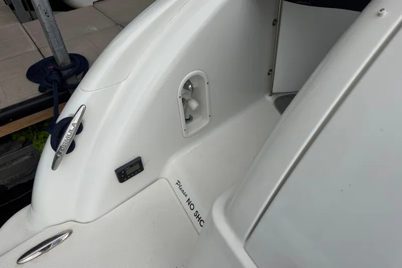 Slide: The Image of 2007 Formula 400 Super Sport boat deck with cleat and rope detail. - 15